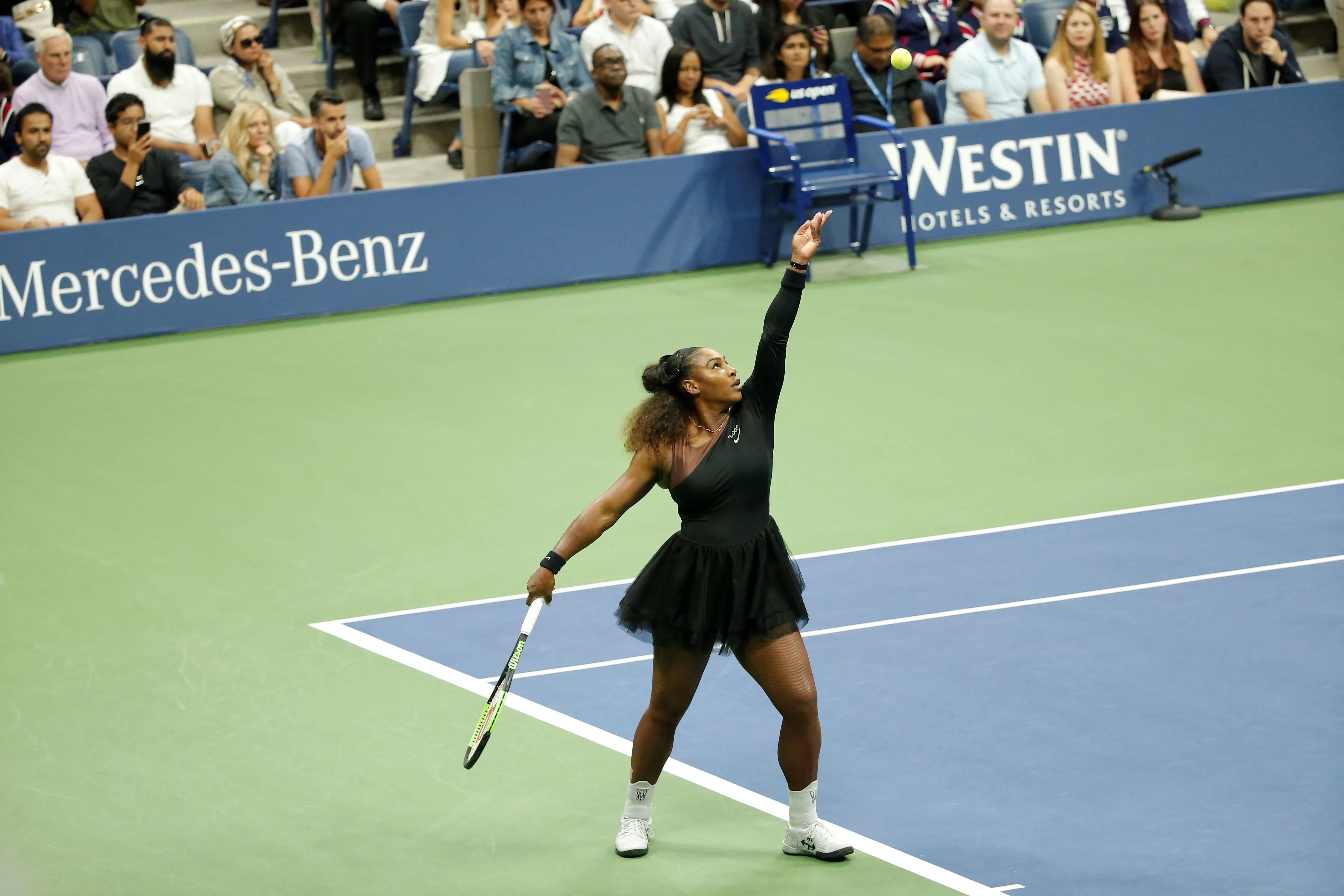 Portrait of Serena Williams serving